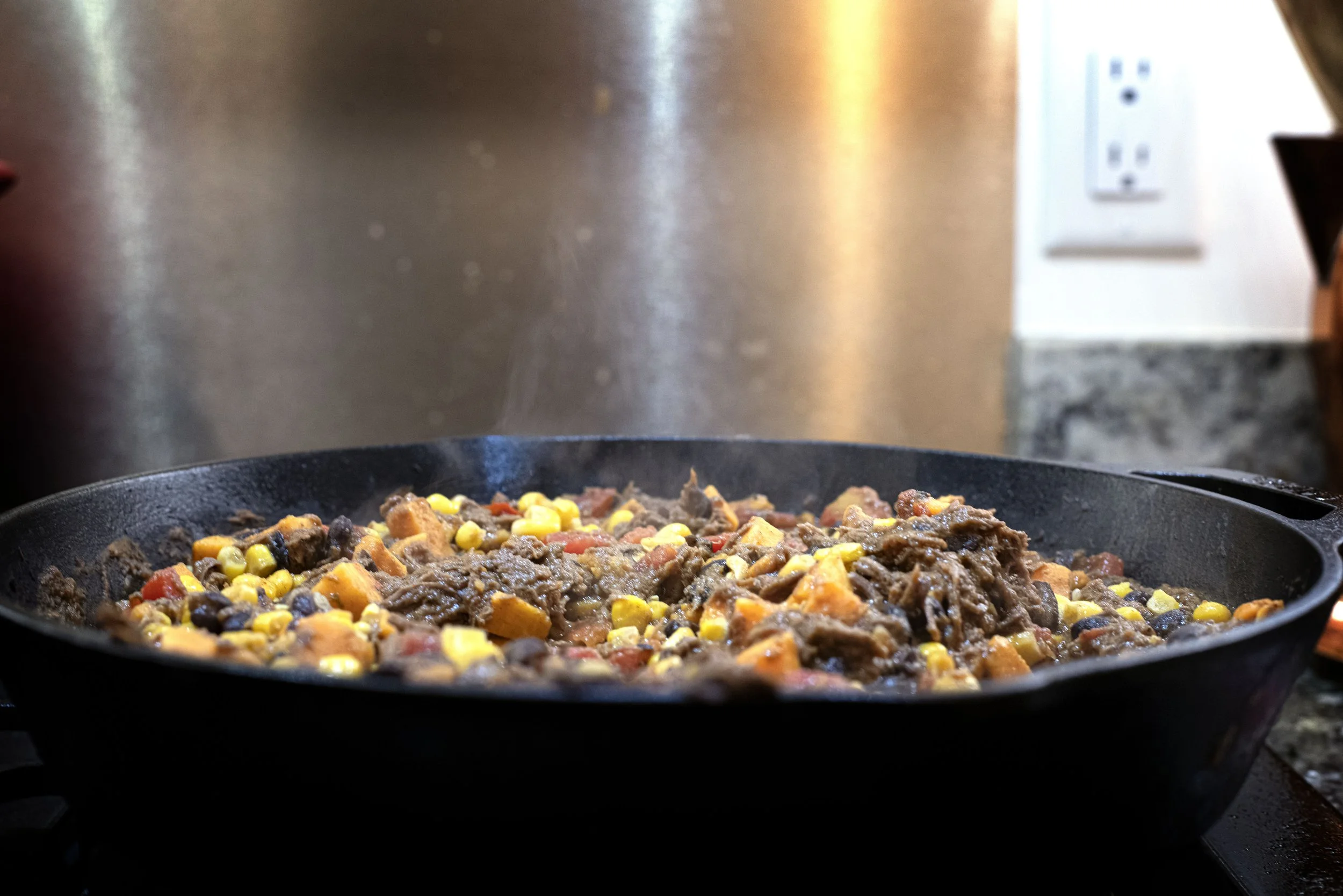 Venison taco meat in skillet ready for plating
