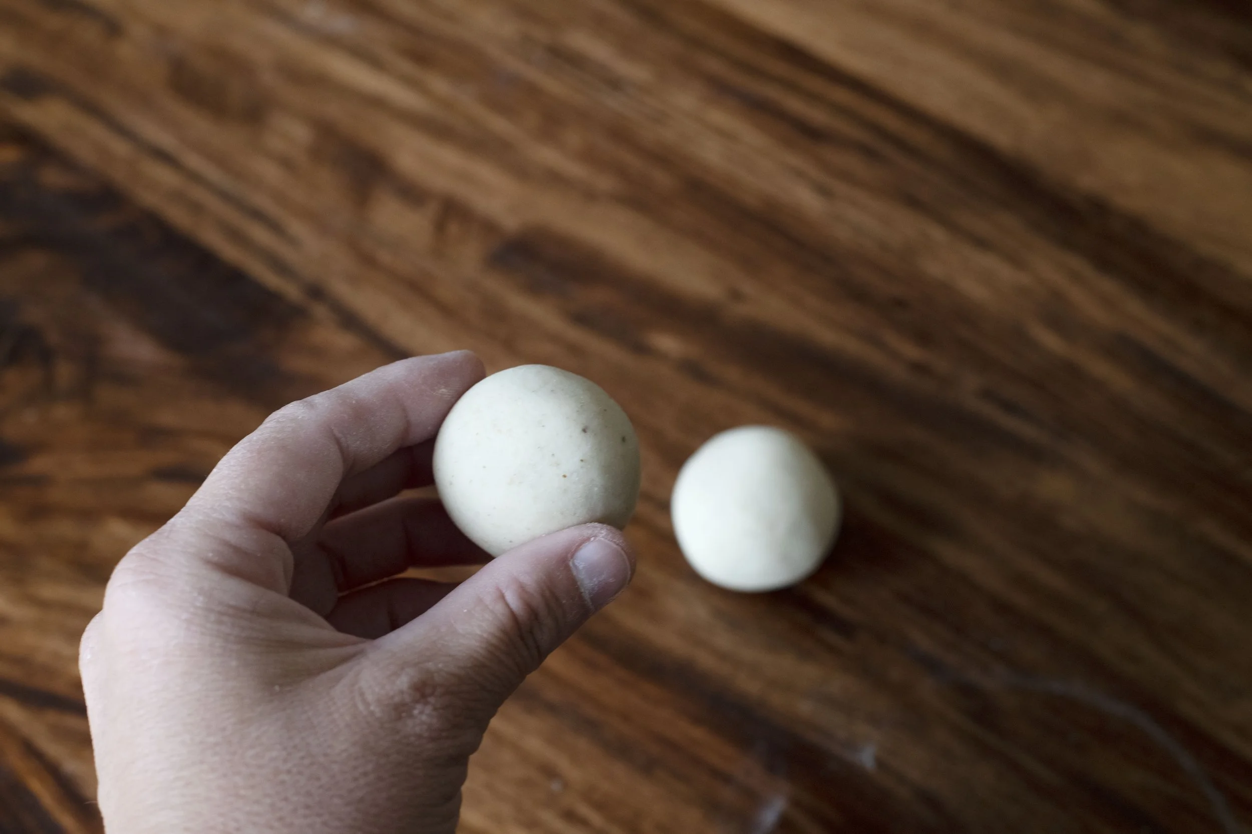 Masa harina dough rolled into golf ball size portions for making tortilla shells