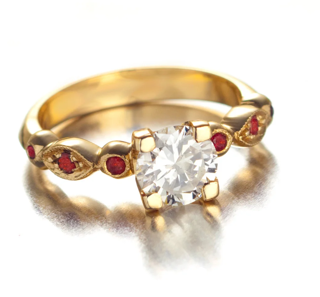 Diamond orange sapphires ring.jpg