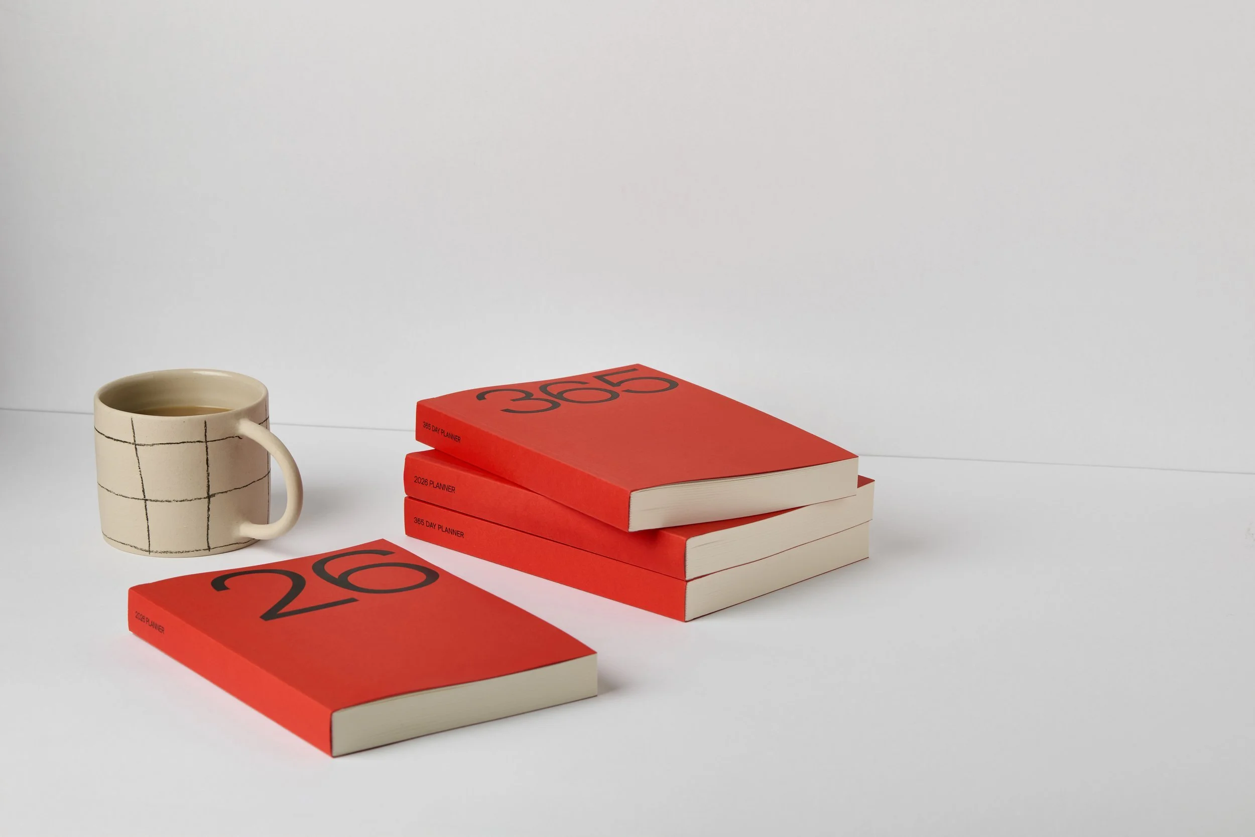Kinshipped_September2025_762_RED_PLANNER_PILE_LS.jpg