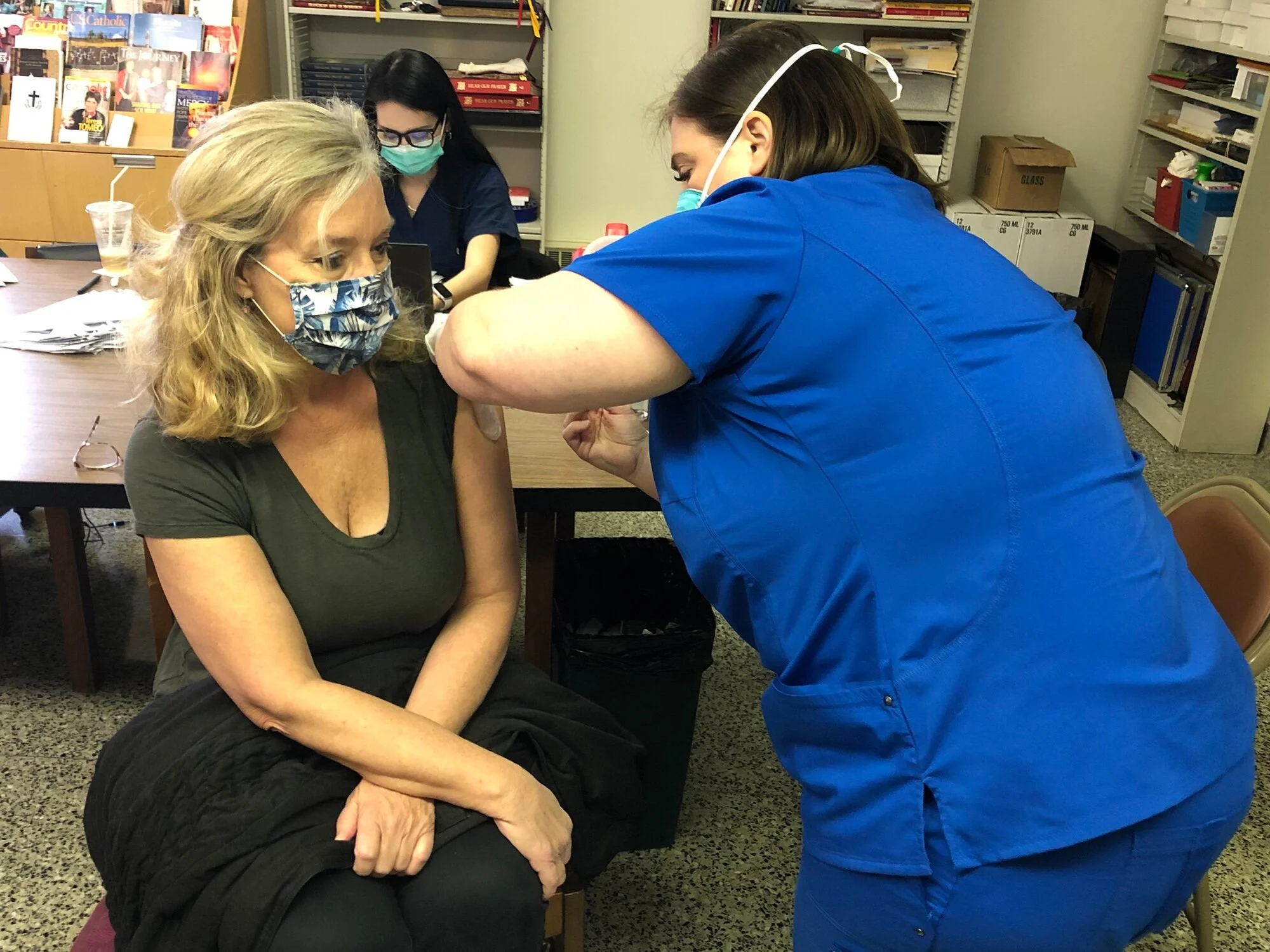 Even employees who were not scheduled to work on January 22 — including nurse Cindy Leininger (left) — stopped in to be vaccinated.