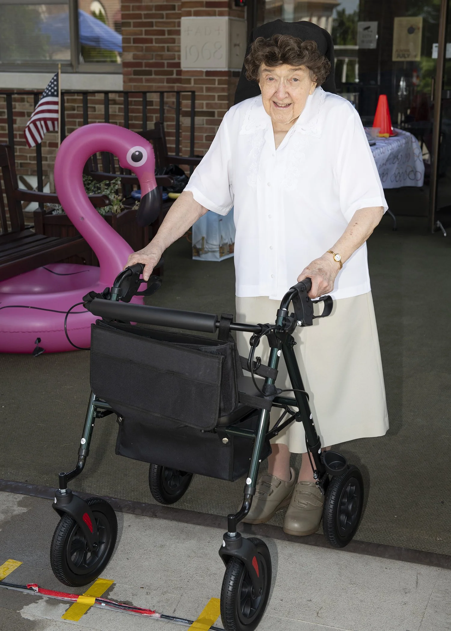 Sister Cecilia Jacko makes her way outside for the summer fun.