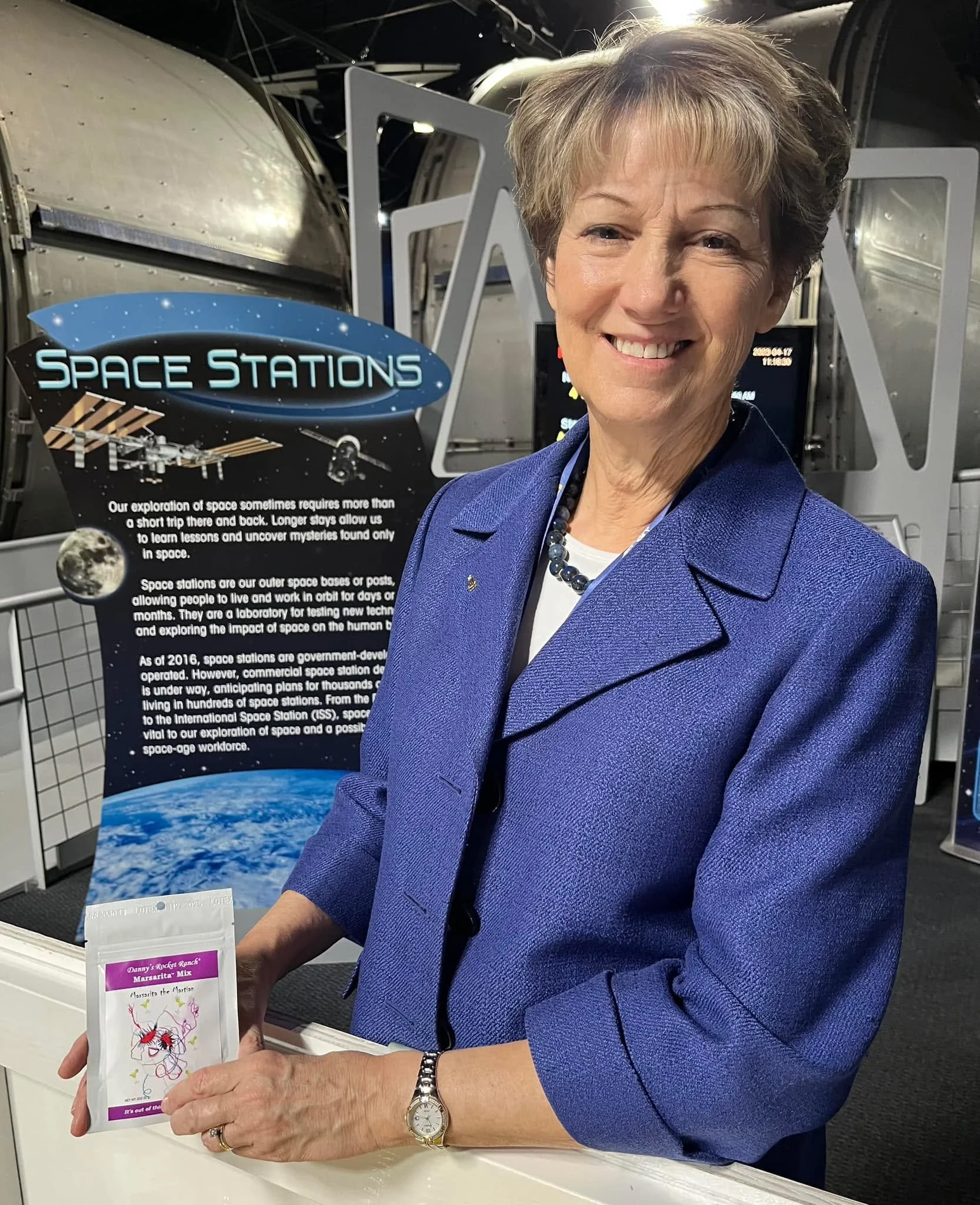 We were ABSOLUTELY thrilled when astronaut Eileen Collins said she would be glad to promote Danny's Rocket Ranch space food products! She is holding a pack of our special edition Marsarita the Martian dehydrated space margarita mix! Order yours today