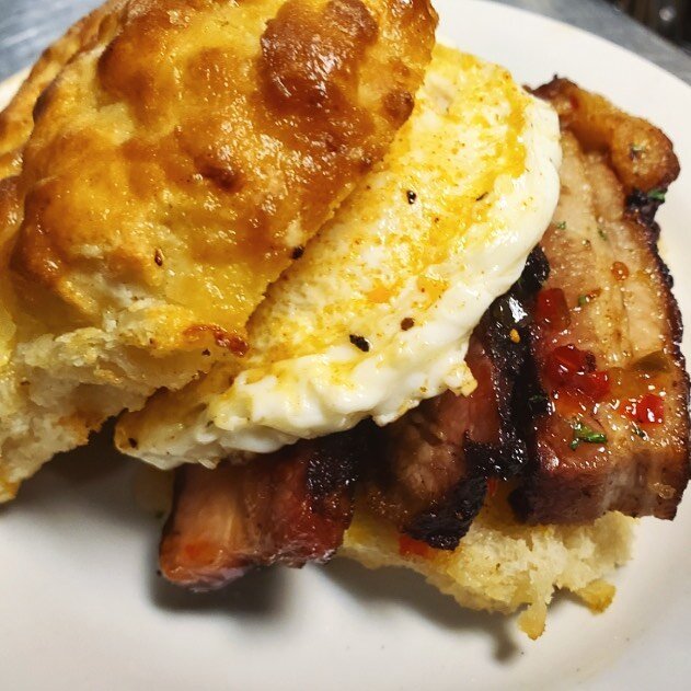 So The Chef and The Pitmaster went into the lab today came back with this one; Smoked Porkbelly &amp; Cheddar Biscuit Sandwich!! Simple but so flavorful, stop in and try it tomorrow morning at Gatlin&rsquo;s BBQ for breakfast. 
7am - 10am Monday thru