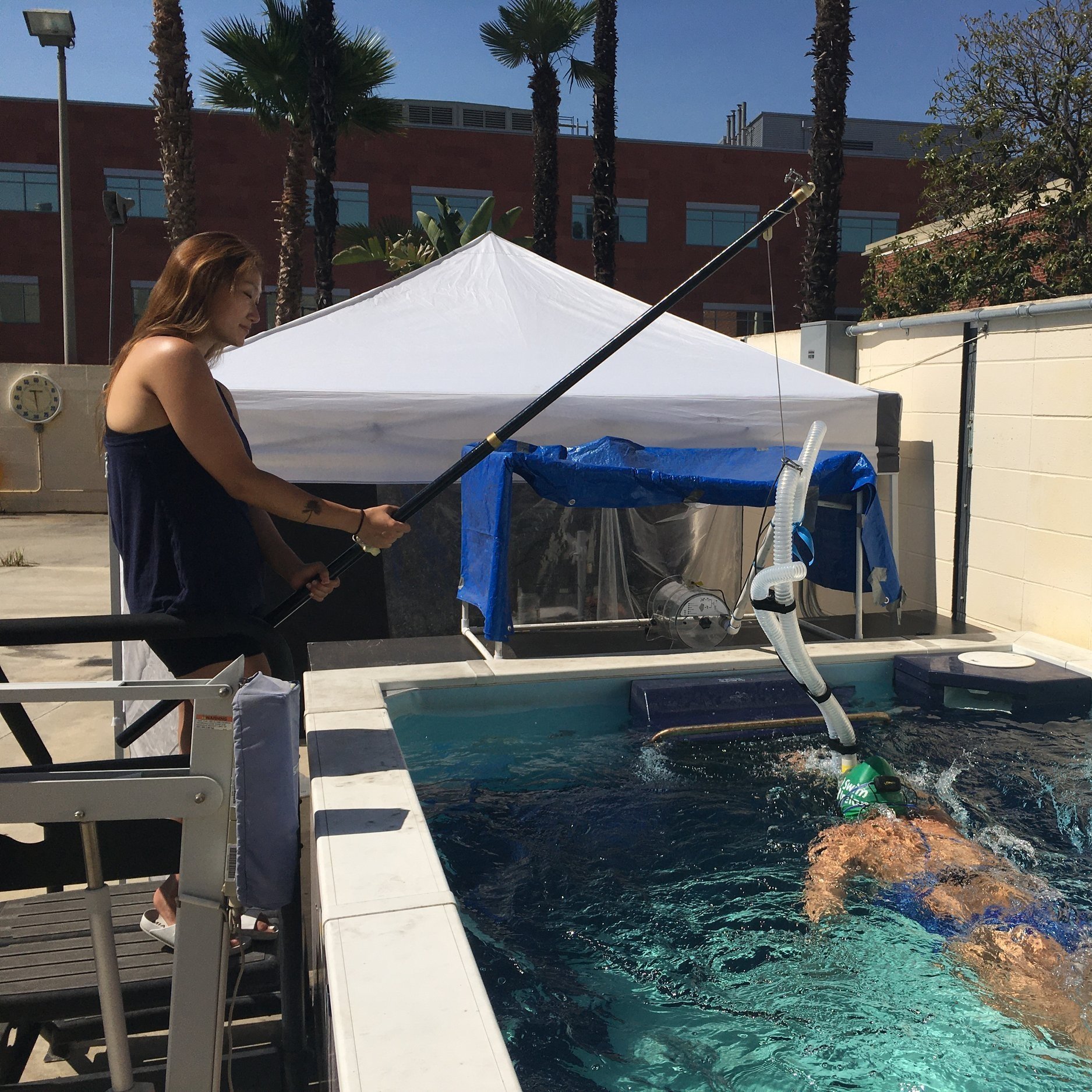 Jane supporting the tubing for metabolic measurement