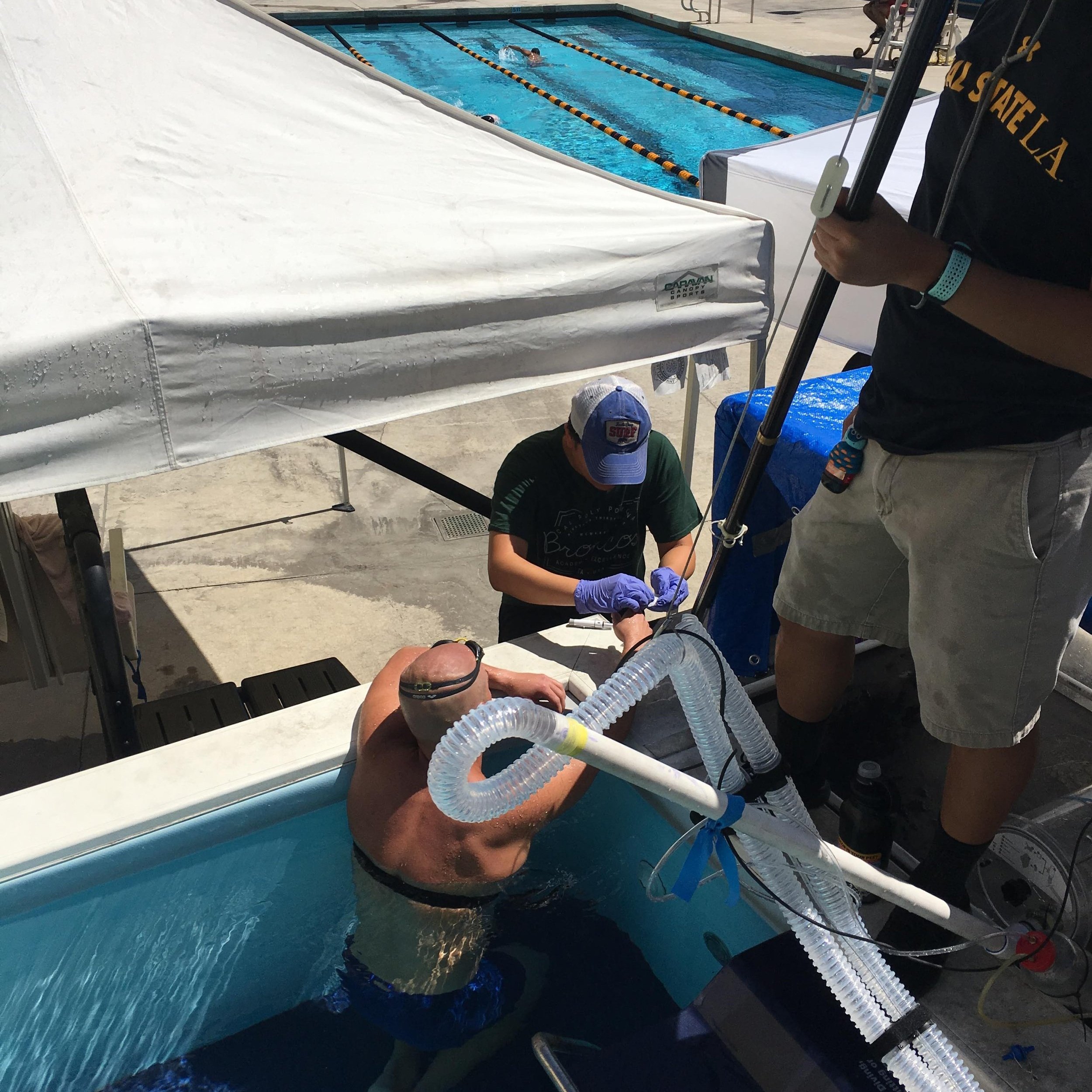 Hans making blood lactate measurements following a swim VO2max test