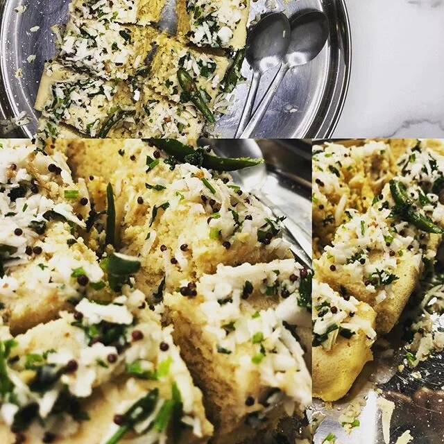 Khaman Dhokla made from scratch without oil or yogurt. Came out super fluffy. Tempering of chillies 🌶  fresh grated coconut 🥥 lemon 🍋 and mustard seeds. Recipe video will be found on our youtube channel. #homemade#plantbased#plantpoweredchefs#vege