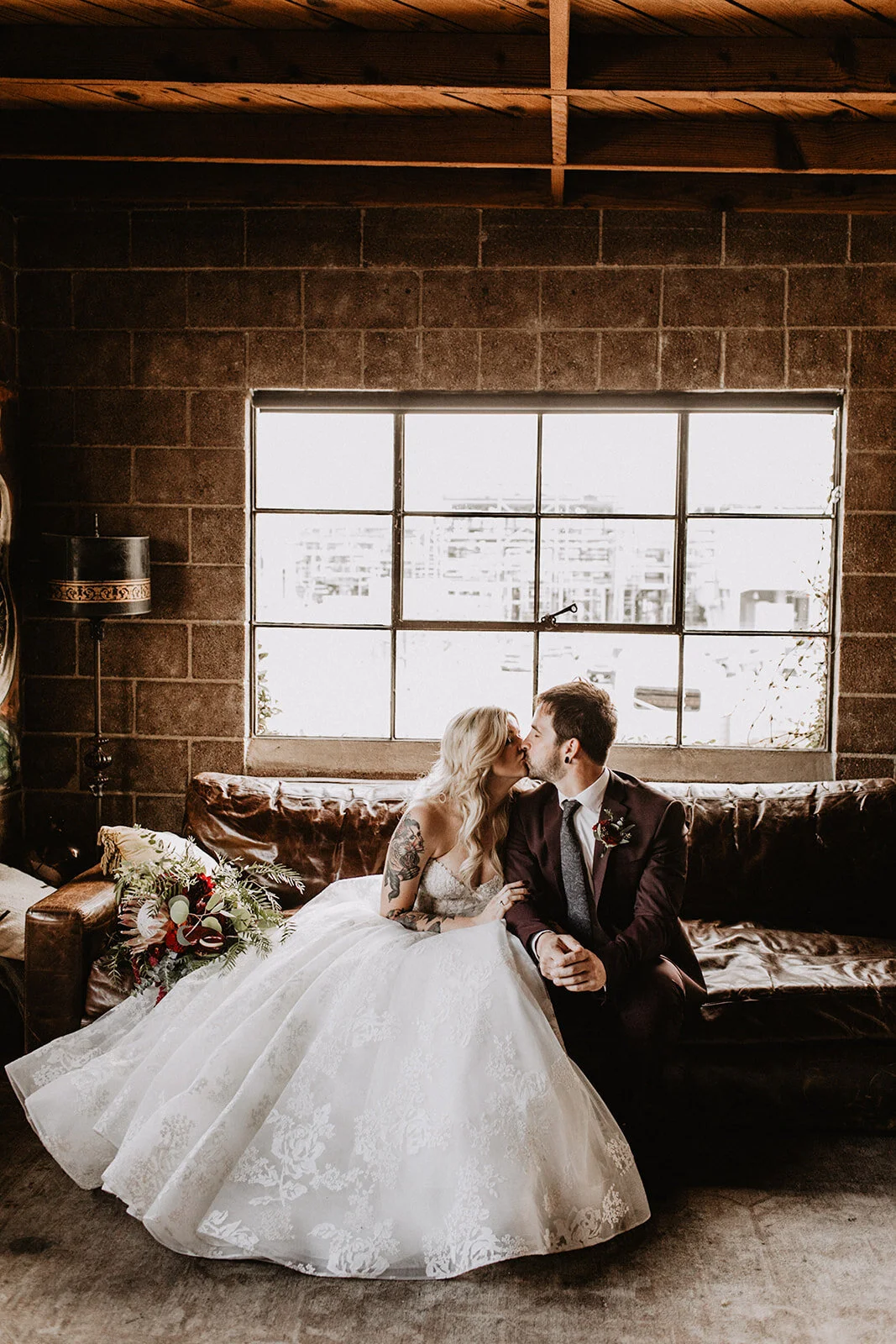 Bride and Groom first look at Smoky Hollow Studios industrial warehouse loft