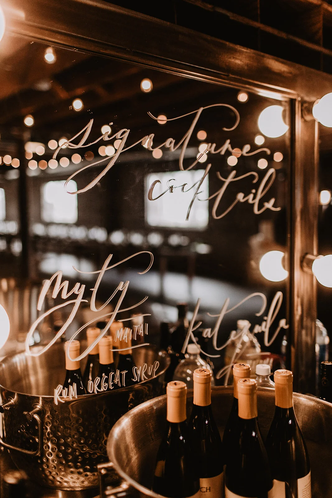 Wedding drink menu in calligraphy on mirror