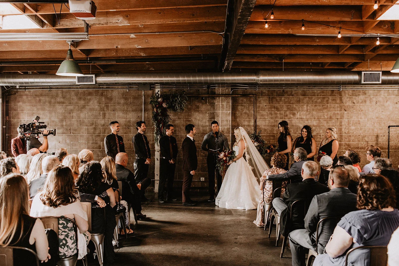 Warehouse wedding ceremony at Smoky Hollow Studios