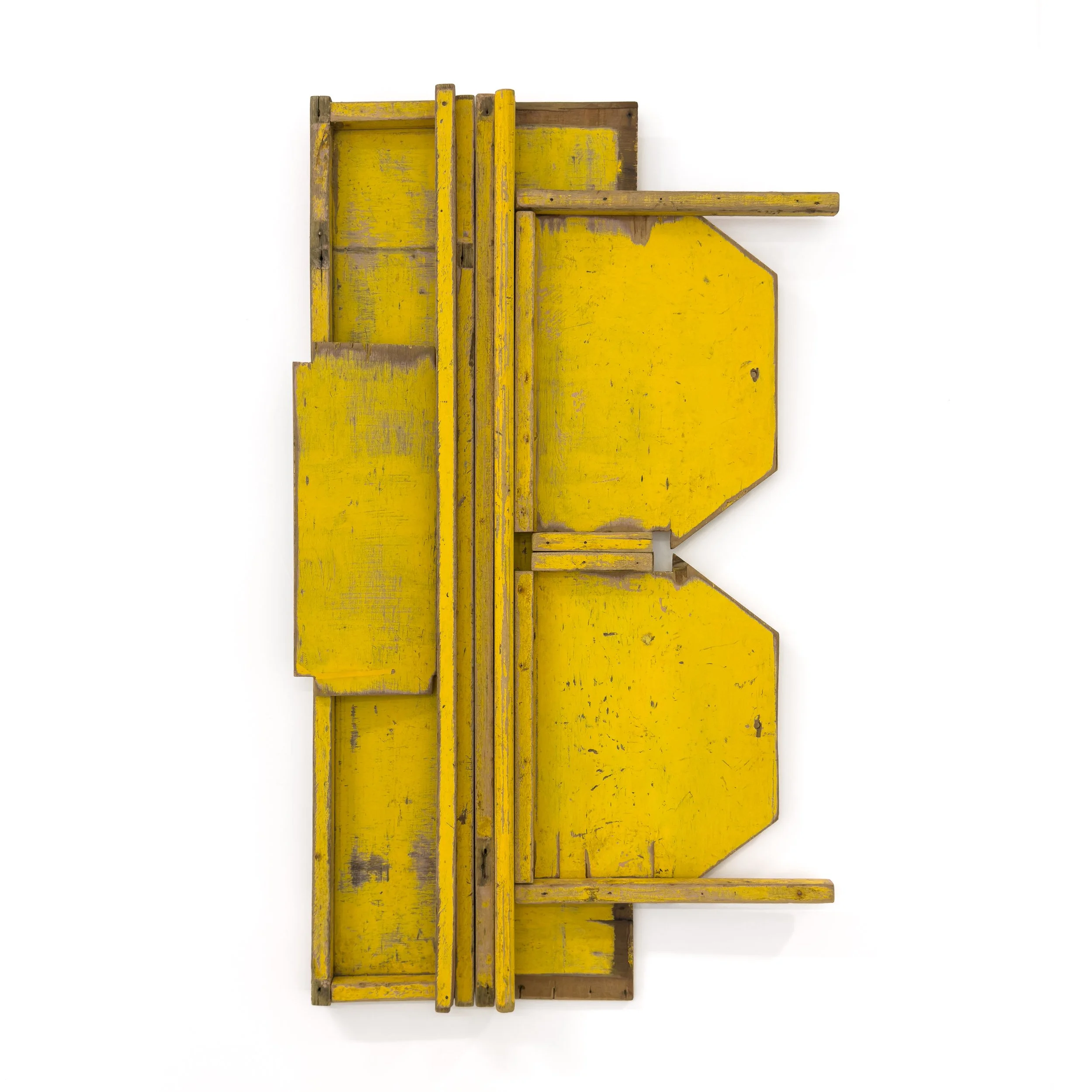 A yellow mixed media artwork made from a deconstructed timber toolbox