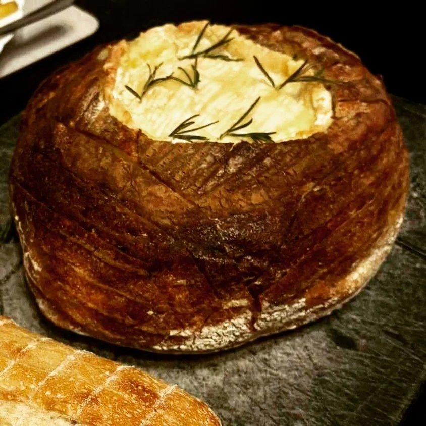 What a fab idea @_logan_jermy to bake St.Bede inside your loaf so that you just have to tear off the bread to dip into the baked cheese 🌟 Gold star for you!