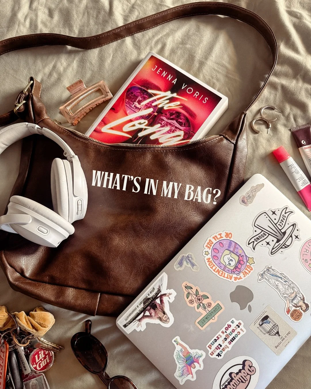 Asking me what&rsquo;s in my bag is honestly a trick question because I&rsquo;m elbows deep in the first draft of a brand new book, so it&rsquo;s mostly just my laptop, my noise canceling headphones, and an overwhelming awareness of my rapidly approa