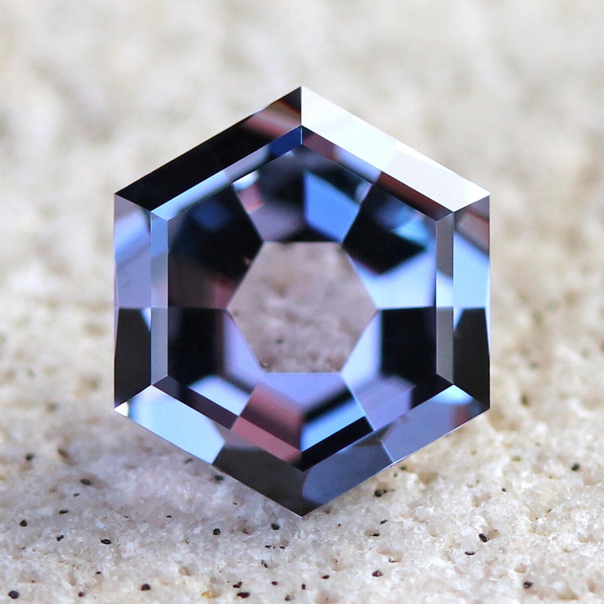 Hexagon Tanzanian purple spinel custom faceted by Trebliganna