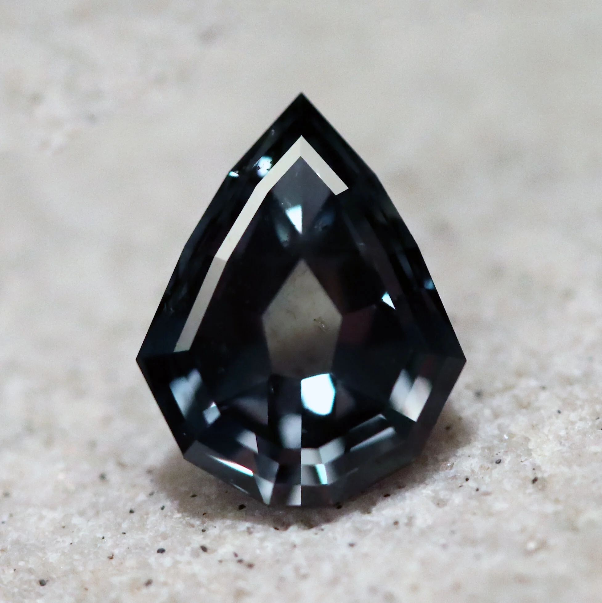 2.05ct green to gray color change geo pear sapphire