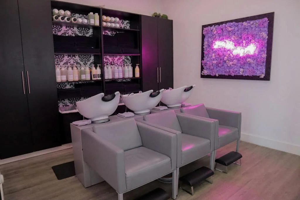 Shampoo stations with reclining chairs at the Live Blow Dry salon