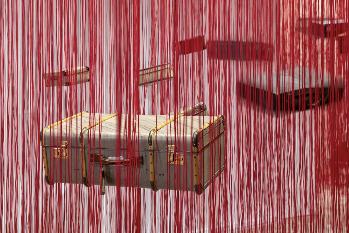 Installation view of Chiharu Shiota’s Accumulation – Searching for the Destination (2014/2025). Photo: by Timothy Schenck, courtesy of the ICA Boston.