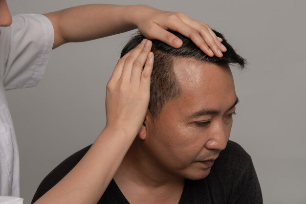 a person with the head in the hair