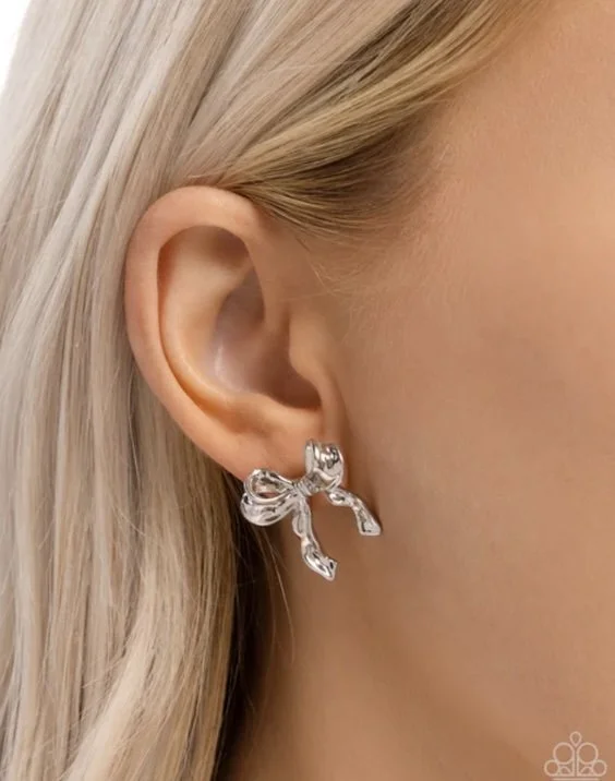 princess treatment silver earrings model CP.jpg