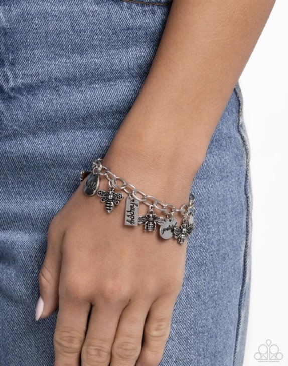 compassionate charm model 04:2025.jpg