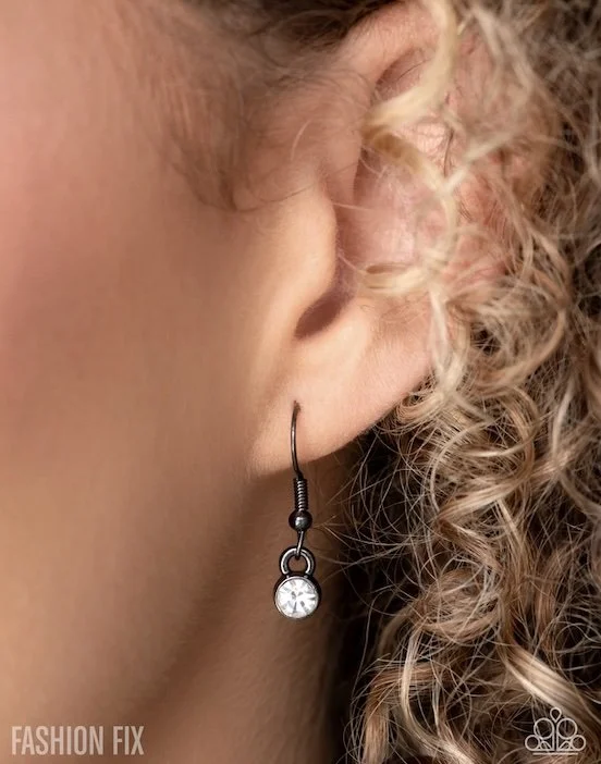 loud luxe model earrings 09:2025 FF Magnificent Musings.jpg