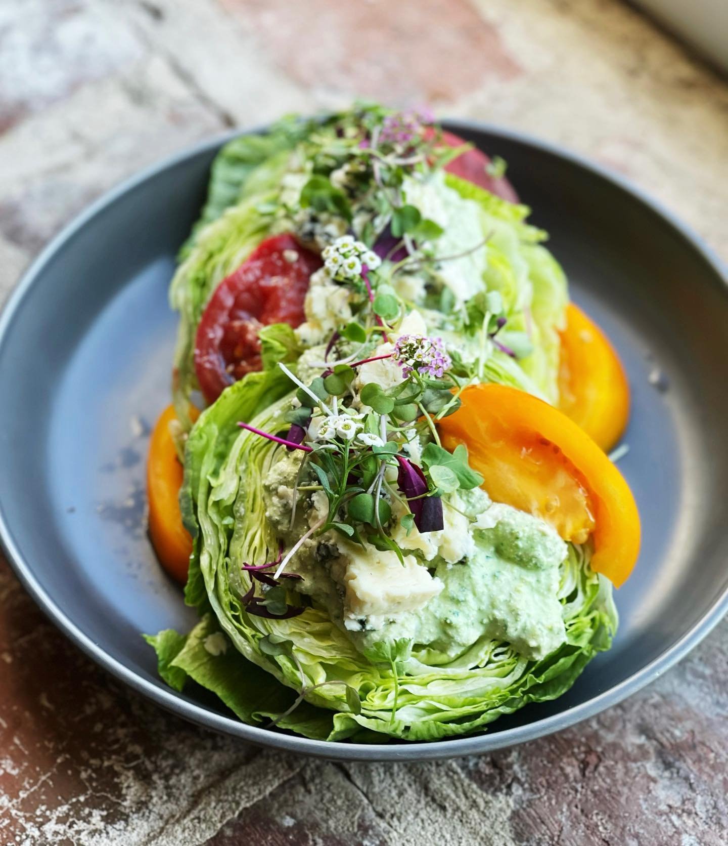 The official salad of Wedge-wood Houston.
&bull;
SUMMER WEDGE // baby iceberg, heirloom tomato, @hookscheeseco blue, bacon tallow blue cheese dressing.
&bull;
{dinner | 5-10pm.}