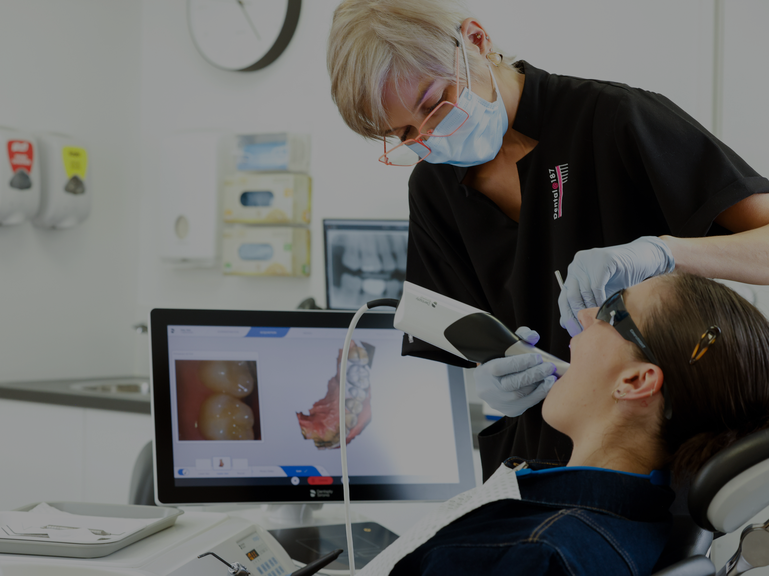 Patient in dental chair having digital scan of teeth