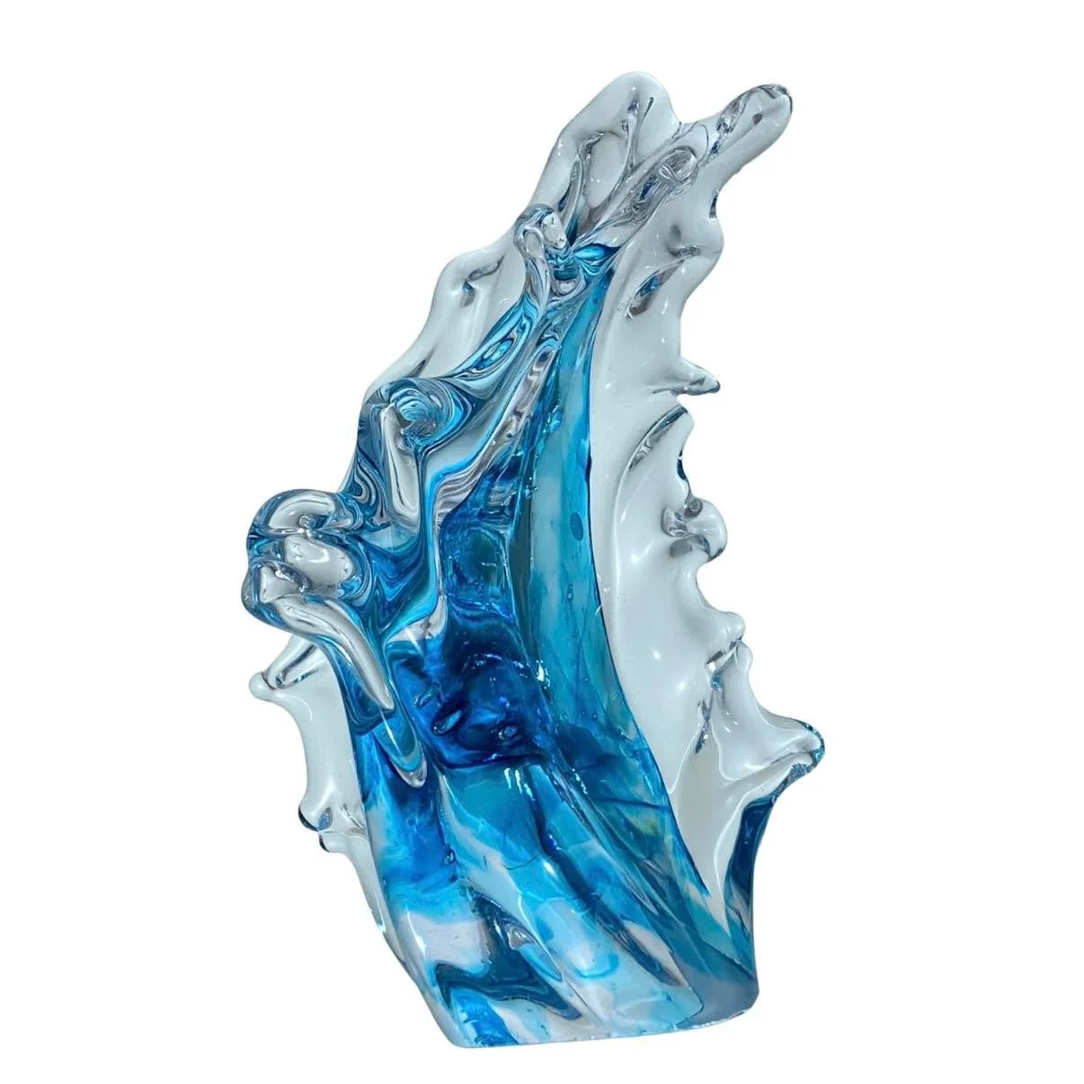 My inspiration for Glass Dancing Waves

&hellip; Crashing waves breaking over rocks as currents bring waves from different 
directions round islands and reefs when I dive in the Galapagos, creating water 
and spray displays.

These waves are solid