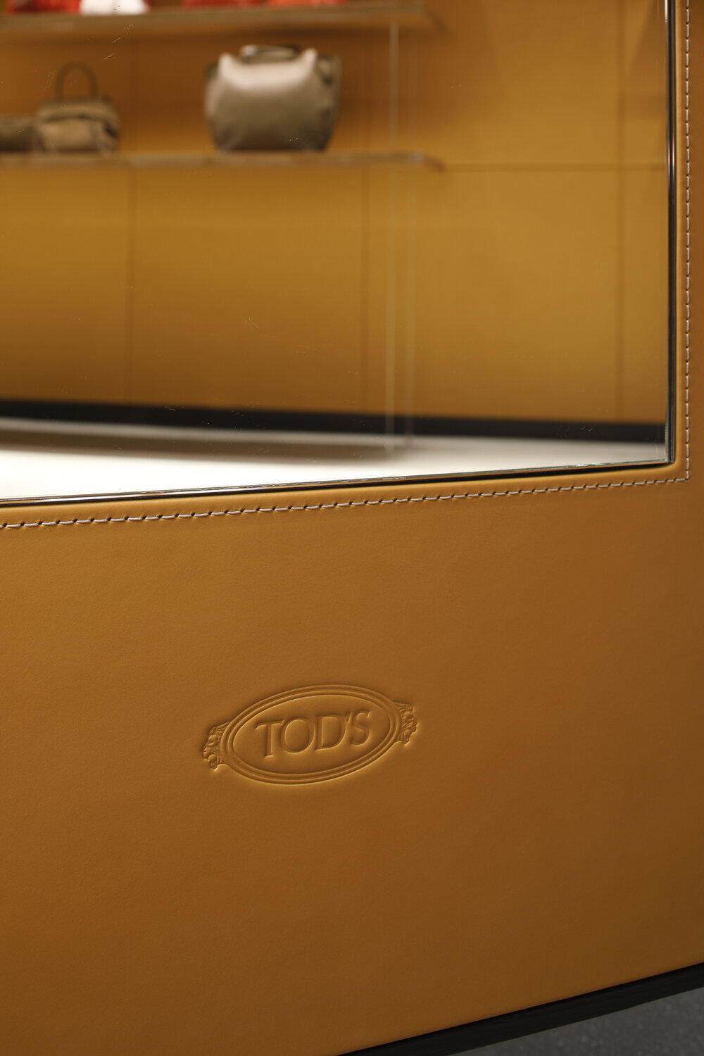  Tod’s Miami - Leather Embossed Tod’s Logo  