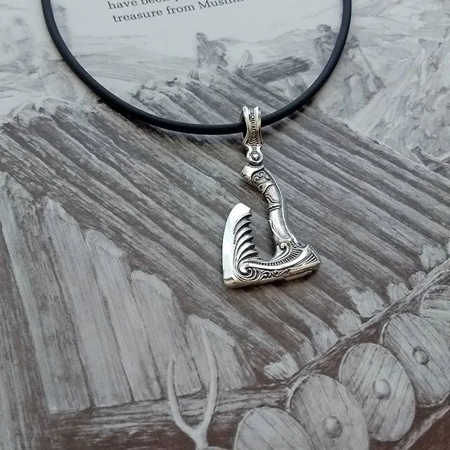 Chop your way through whatever life might throw at you.  Sterling silver.  Detail on both sides. Available at mytotem.ca. #mytotem #axe #axependant #jewelryfashion #fashionjewelry #fashion #giftidea #jewelryformen #pendantformen #sterlingsilver #stel