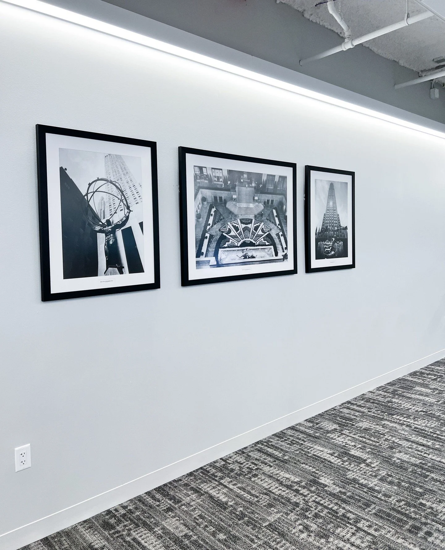 In the Arlington lobby, Creative A paired archival Rockefeller family photographs with abstract forms across nine custom pieces&mdash;merging corporate lineage with modern visual language for an elevated workplace experience.⁠
&bull;⁠
&bull;⁠
&bull;⁠