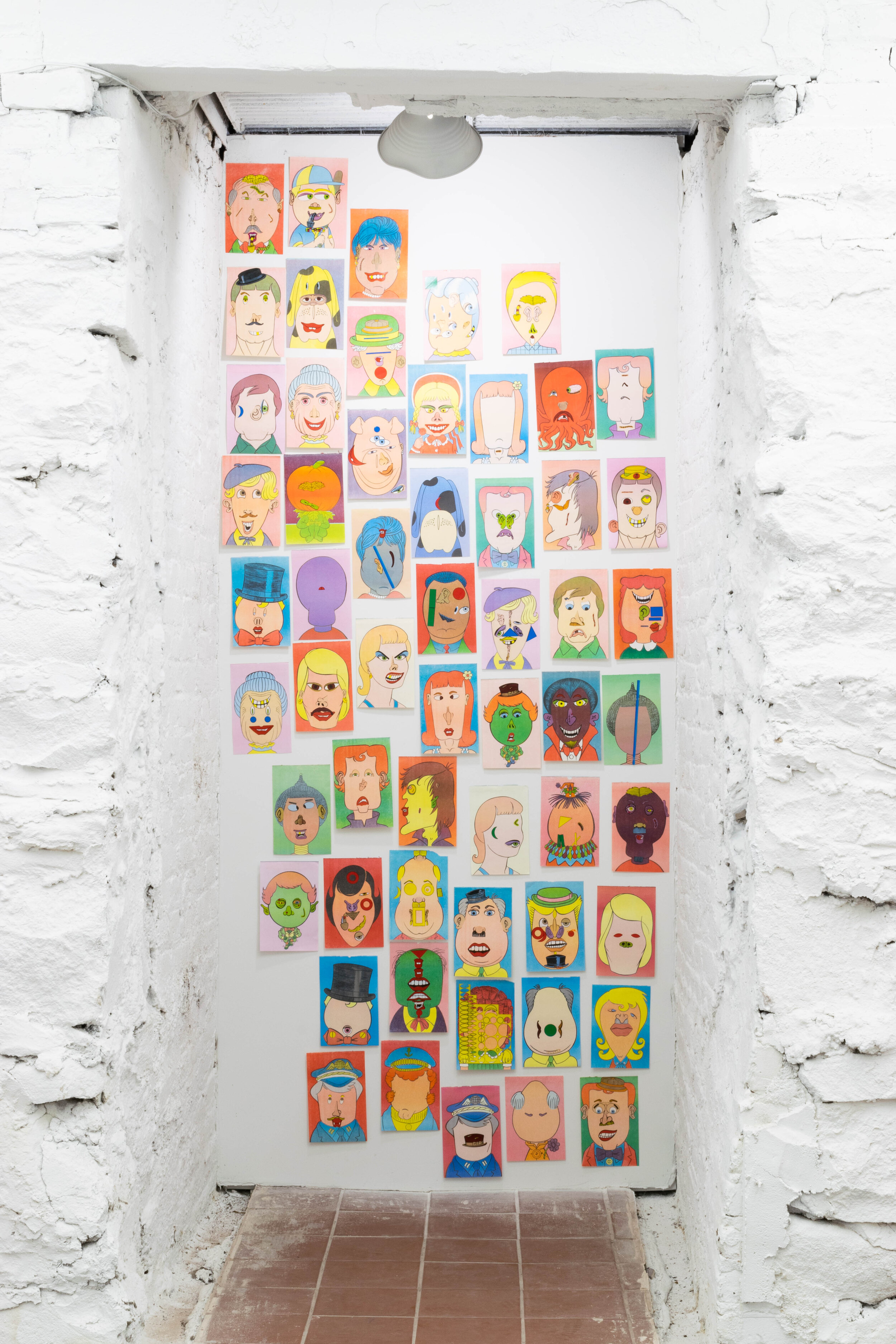 Untitled (faces), 1995/2019, stickers on printed paper