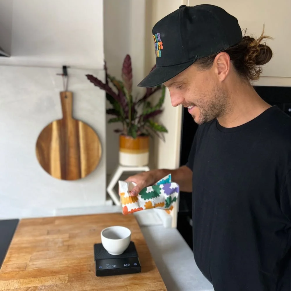 Tom Using coffee scales