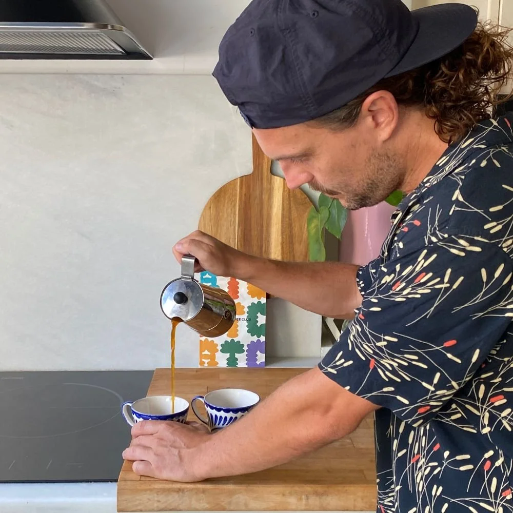 Tom Making espresso at home