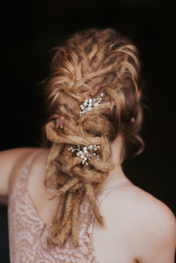 Updo on Locks with bridal hair accessoryy