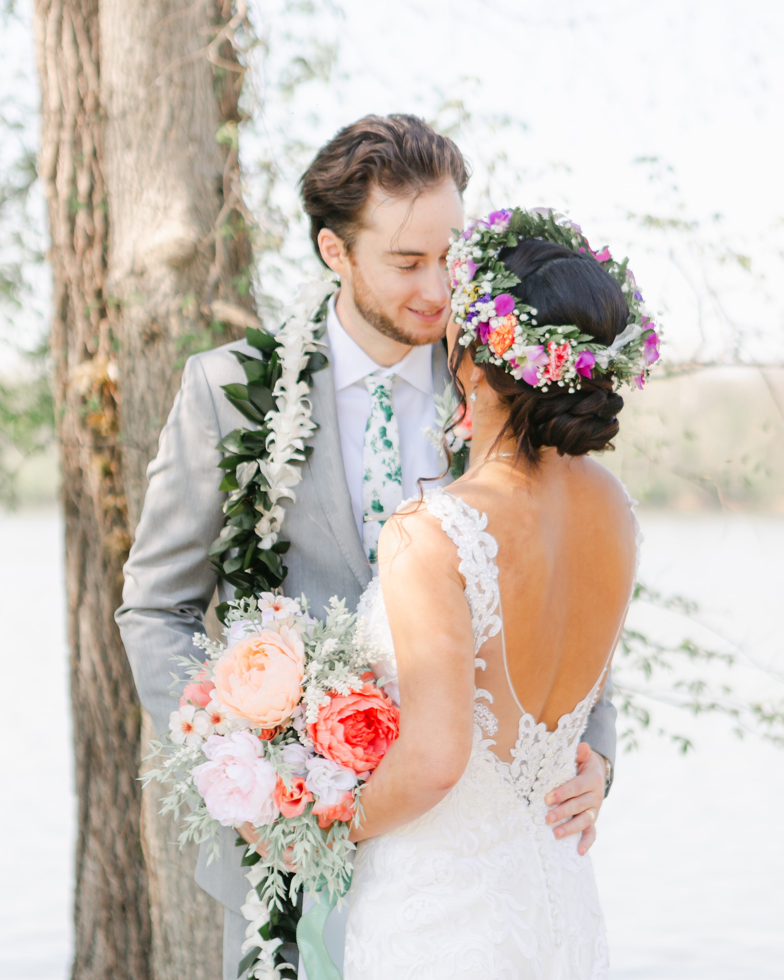 Polynesian wedding with flowers crown and bridal updo