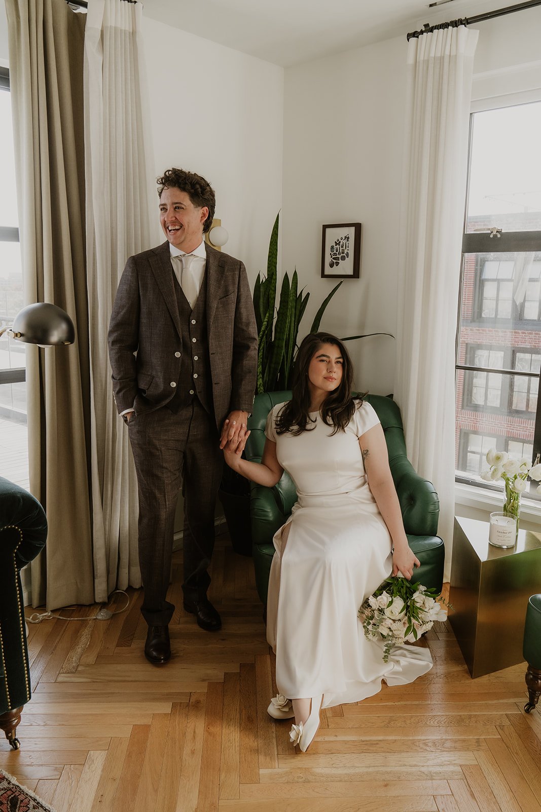  One marrier has neutral makeup &amp; a soft bend in their dark hair. The other marrier is transgender &amp; has tzone / blemish makeup on &amp; lite coiffing to polish their natural curls. 