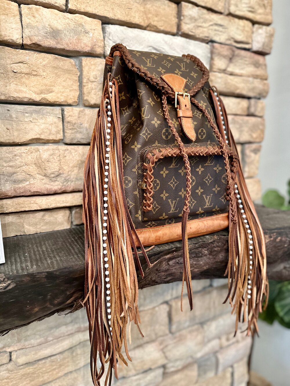 louis vuitton backpack with fringe