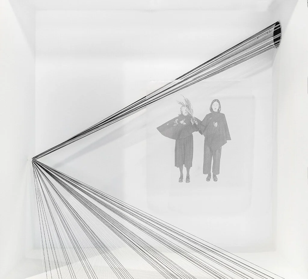 Avis Yu Han Ho and Emma Aurelia Warp/Weft , 2019 Warp: cotton thread Weft: wool, polyester, cotton, printed on silk organza Photograph on textile by: Michael Tuciap Image courtesy of Brian Medina