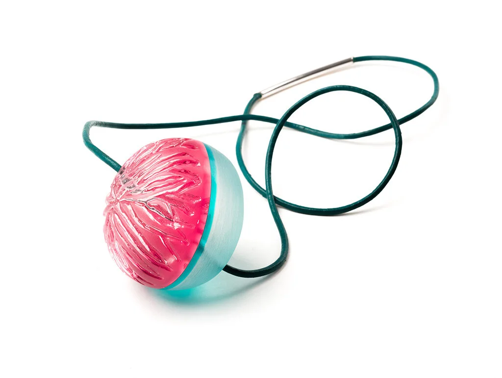Lush Fruit Pendant, 2016 Carved acrylic, sterling silver, leather, resin Image by Grace Laemmler