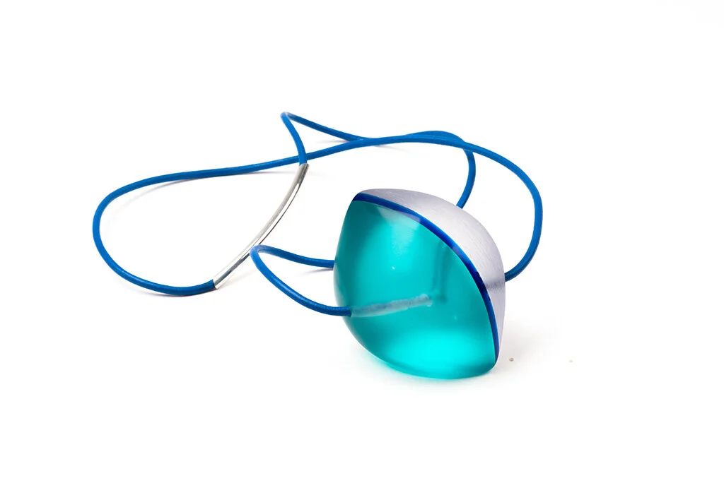 Wave Form Pendant, 2016 Carved acrylic, sterling silver, leather Image by Grace Laemmler