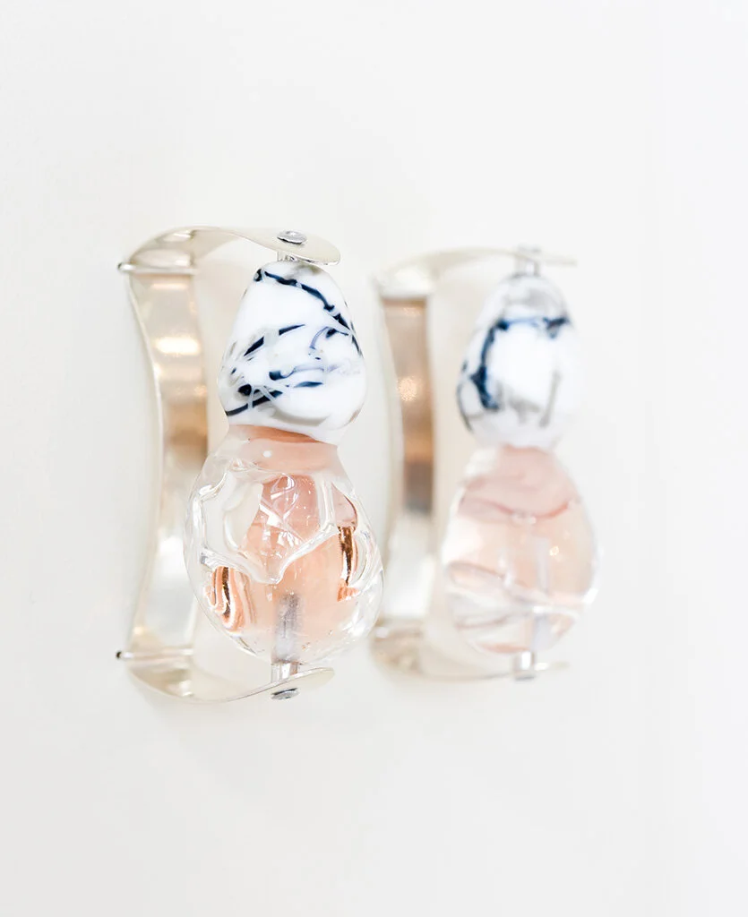 Flesh and Stone Rings, in situ at Mary E. Black Gallery Lamp-worked glass, sterling silver Image by Grace Laemmler