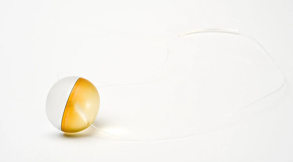 Milk and Honey Pendant, 2016 Carved acrylic, sterling silver, nylon Image by Grace Laemmler