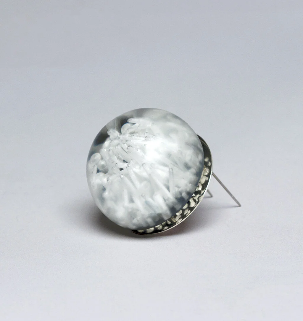Hidden Reflector Brooch, 2015 Carved acrylic, sterling silver, resin, steel Image by Ryan Bruce