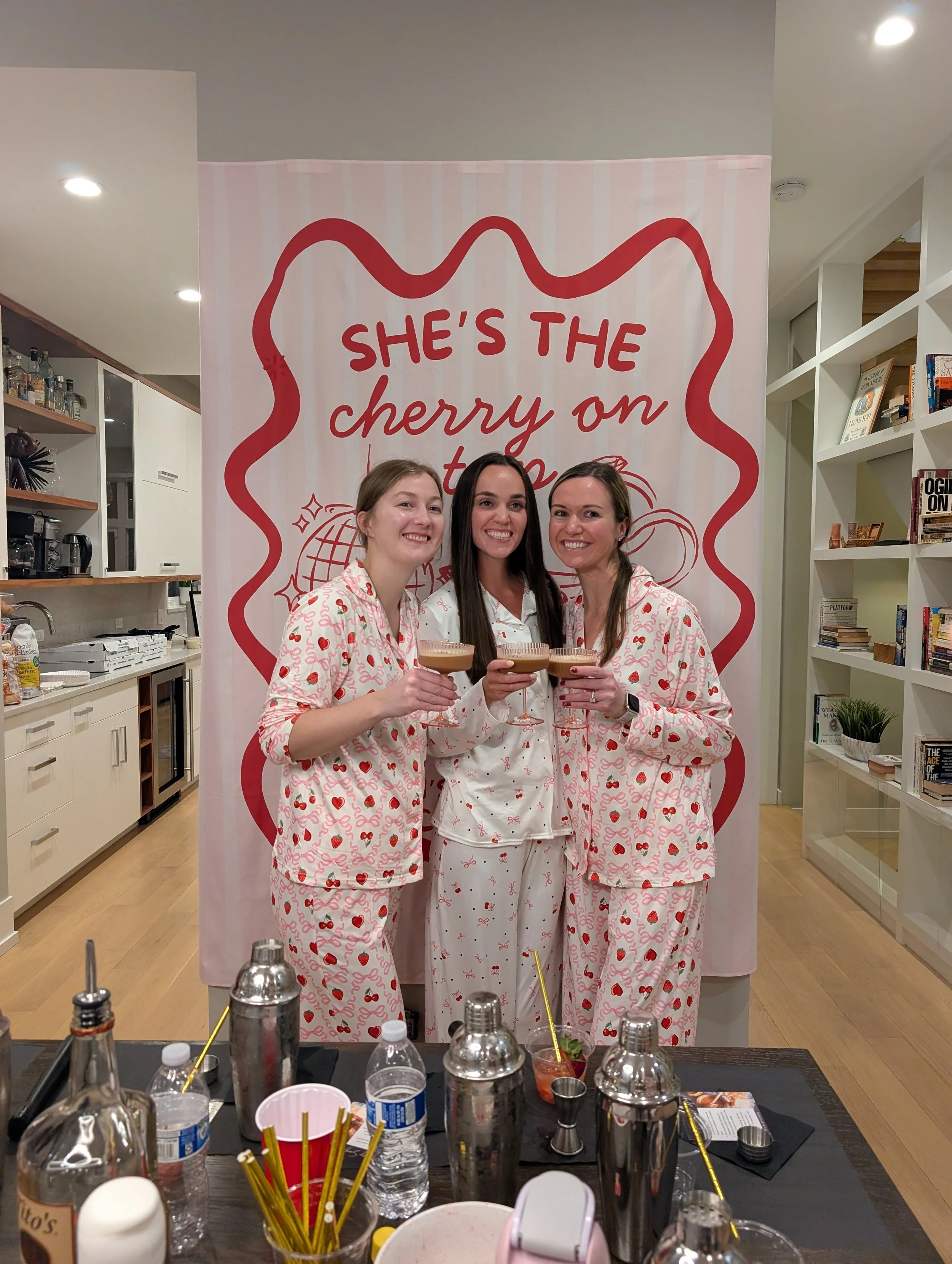 Guests toast with espresso martinis during a Chicago bachelorette cocktail class