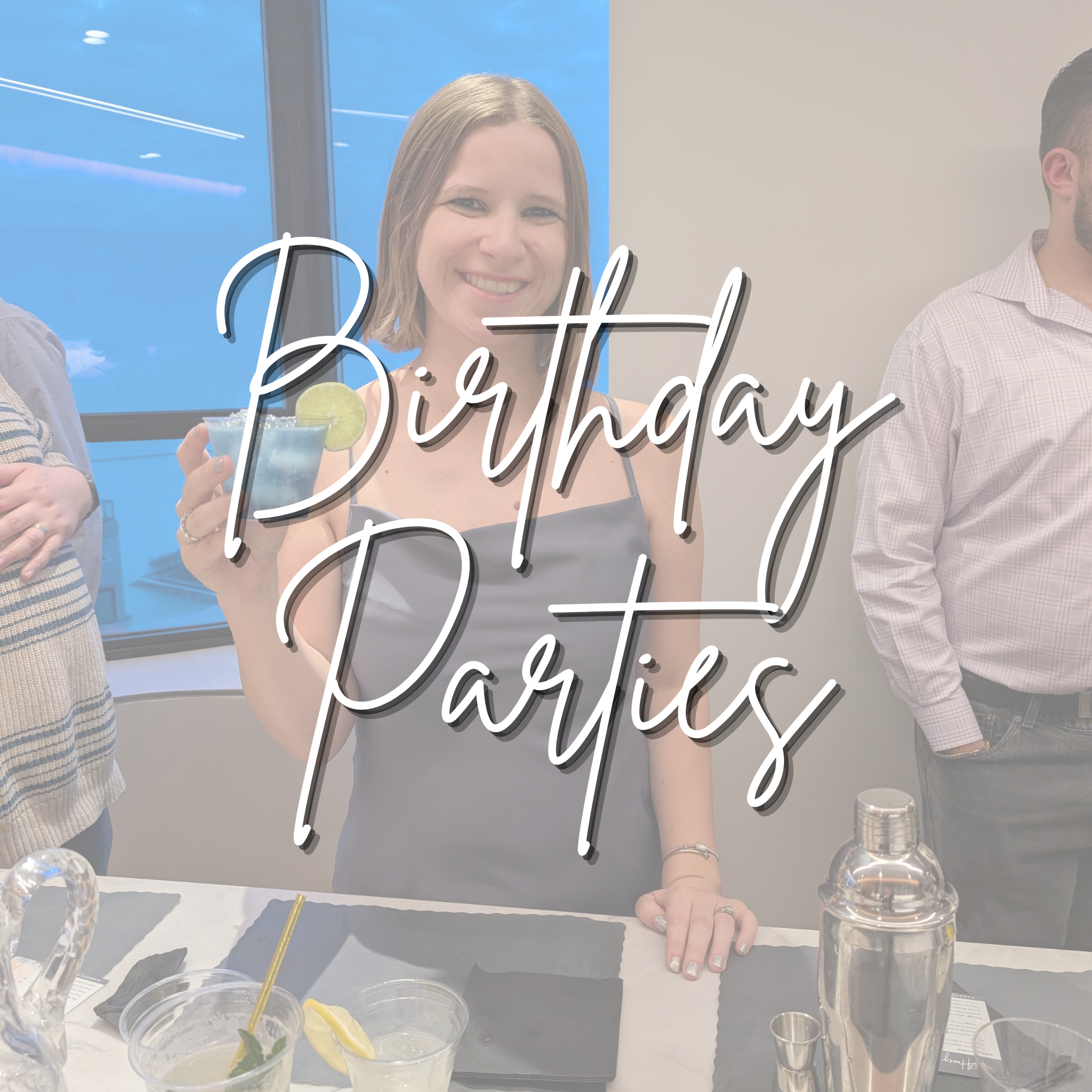 Birthday guest holding a lime-garnished cocktail during a BarBees class