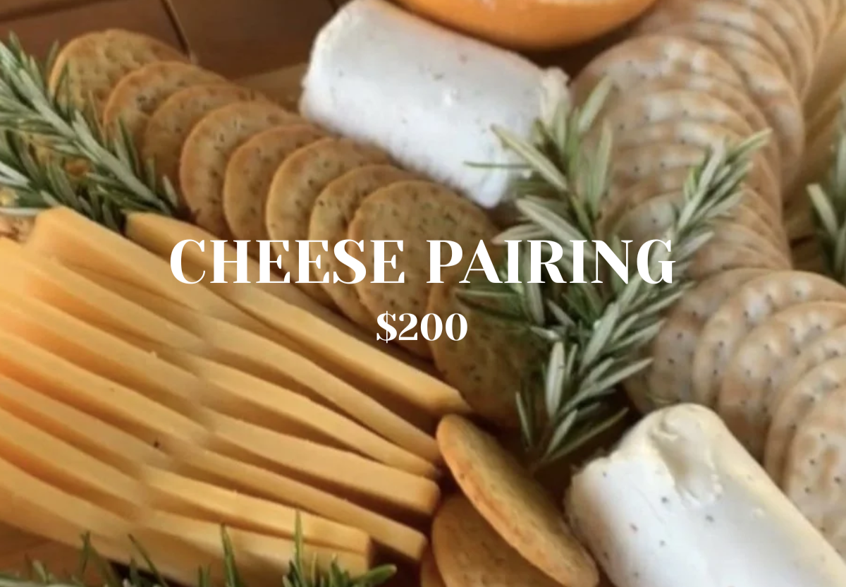 Assorted cheeses and crackers offered as a BarBees cocktail class pairing