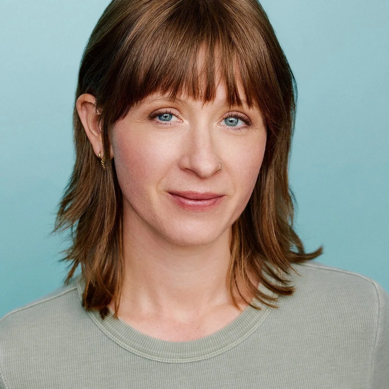 Emily Mange (she/her)