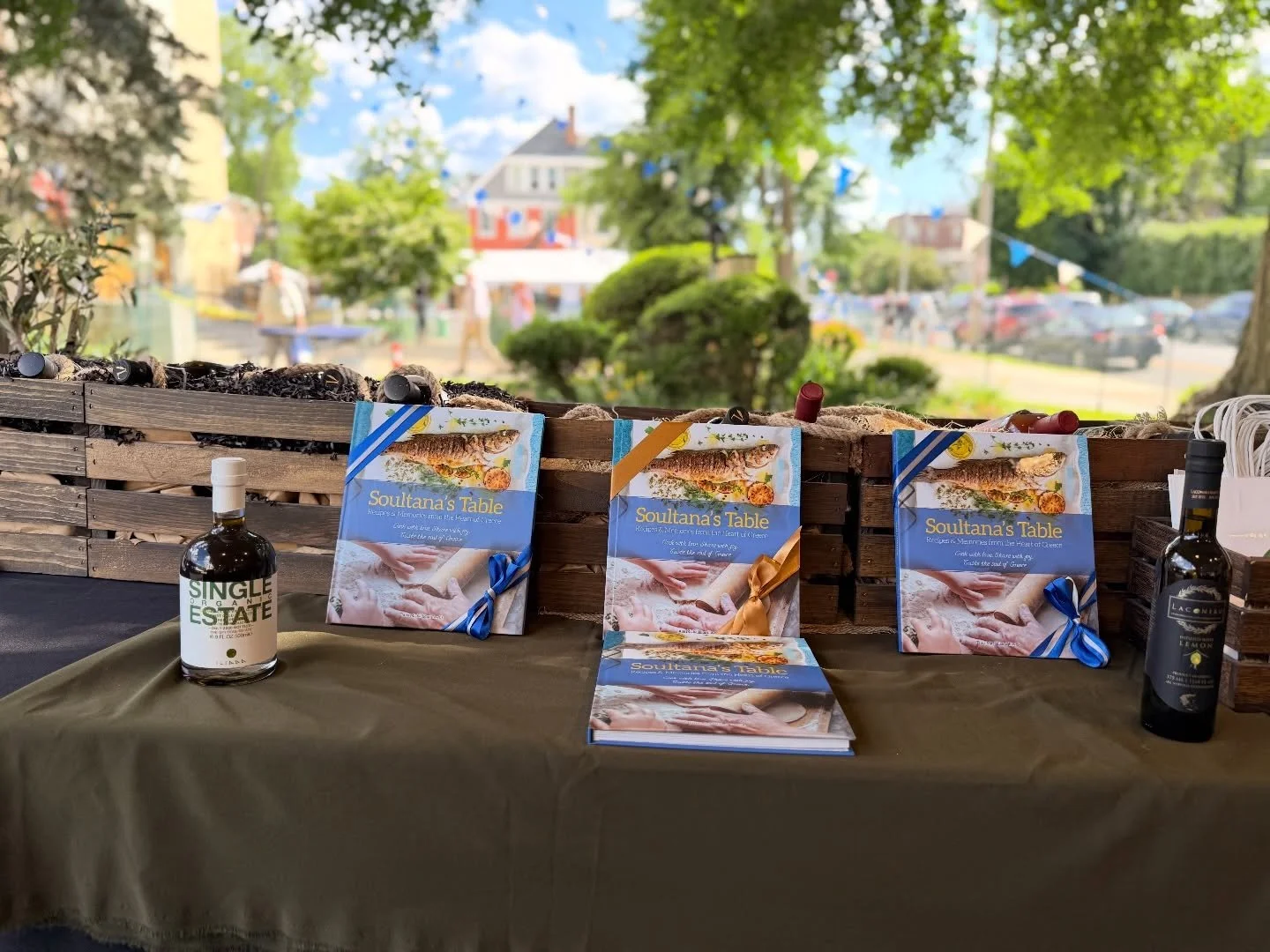 The booth is set. The cookbook is ready. Greece came to Wilmington. 🇬🇷🫒
Find us at the Wilmington Greek Festival, June 1&ndash;6 and grab your copy of Soultana&rsquo;s Table &mdash; the cookbook inspired by the oil that started it all.
🍽️ Real re