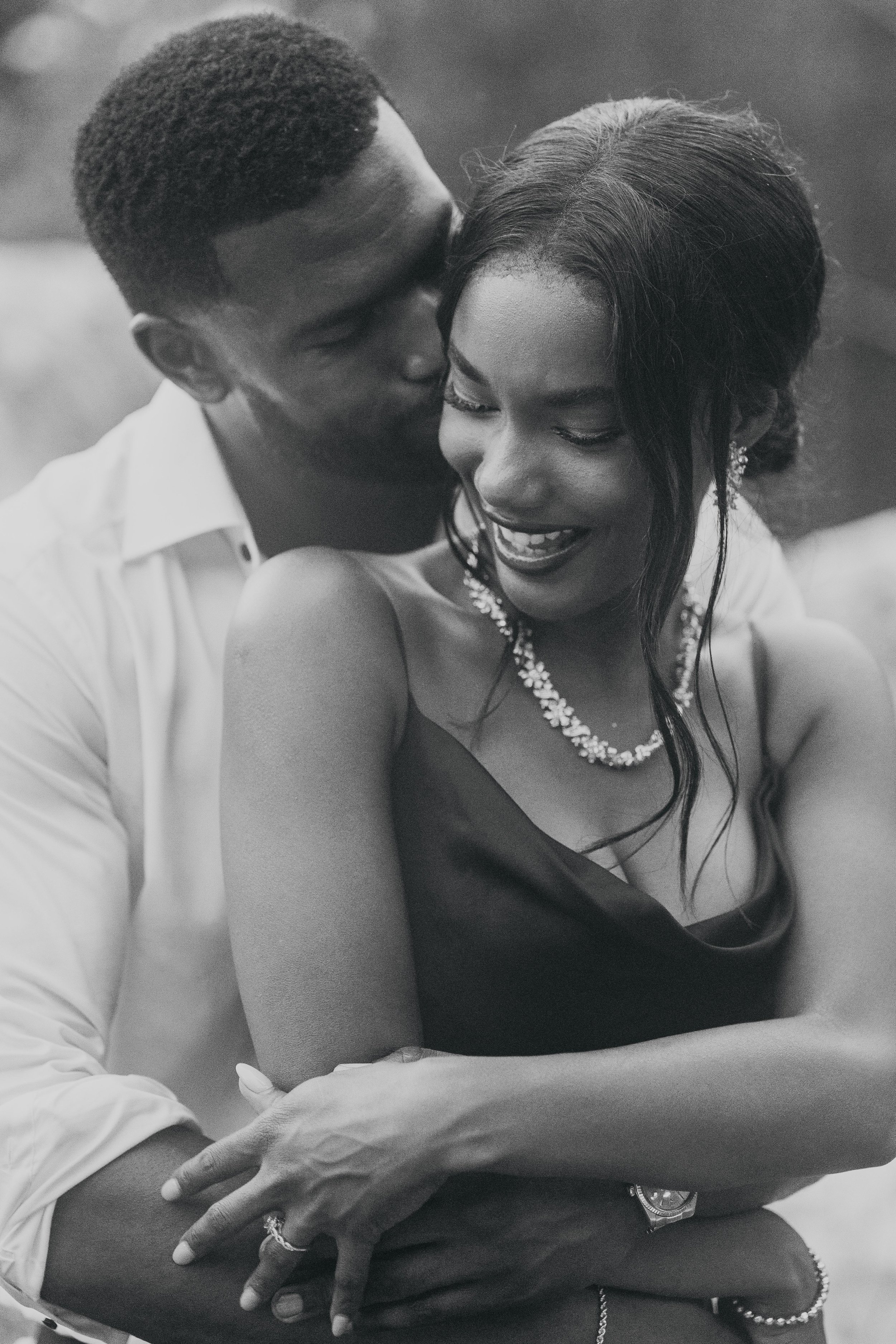 Sweet moment captured of couple in formal gown, Atlanta Georgia wedding guest outfits